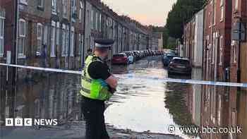 Road seriously damaged after pipe-burst flood