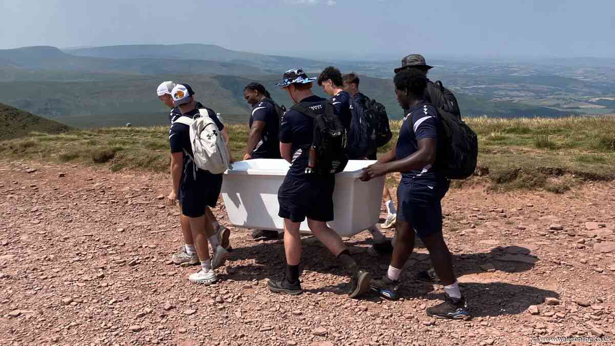 Man apologises for 'mindless' act on Pen y Fan as disgusted rugby team step in