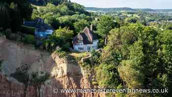 Huge part of cliff collapses near stunning home - just days before it failed to sell for £250k