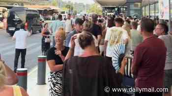 European airport chaos as Brits are caught up in hours-long queues spilling into carparks as summer getaway is hit by EU border check changes