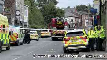 Middleton incident RECAP as emergency services swarm town centre in stand off with man on roof