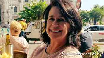 Woman, 70, charged with murder of British expat found stabbed to death at home