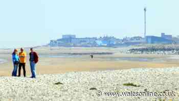 Police cordon on coastal path and beach after suspicious item being found