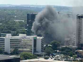 Fire at parking garage fills sky with smoke near downtown Austin