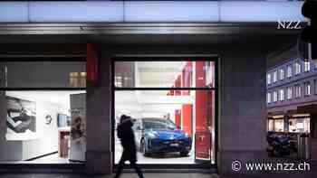 KURZMELDUNGEN - Wirtschaft: Tesla macht weniger Gewinn +++ Google-Mutter Alphabet übertrifft Erwartungen