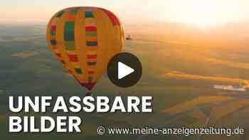 Weltpremiere: Extremsportler springt mit Bike aus nahezu 1000 m