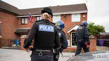 Doors put through and children led away as police swarm Merseyside