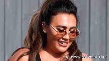 TOWIE's Lauren Goodger is clad in head to toe designer gear as she rocks £4k Chanel bag, £730 Prada vest and £75 D&G boxer shorts for filming