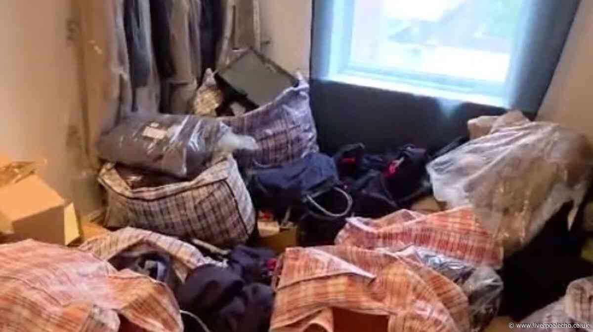 Moment police find £500k worth of designer goods during raid