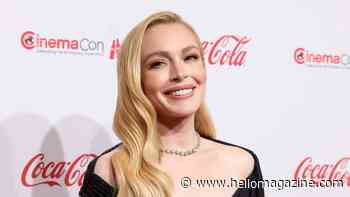 Lindsay Lohan and her sister stun as they tease their colorful swimsuits in beachside snaps