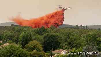 Tens of thousands forced to flee French holiday spot as fires spread across Europe
