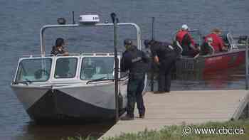 Parents in 'unimaginable pain' as search continues for second child in Manitoba lake