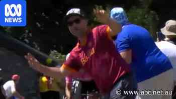 Stage winner almost hits overzealous fan in gruelling Tour de France climb