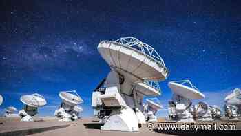 Is THIS why we haven't found aliens yet? Scientists claim extraterrestrial signals be hiding on a different radio channel