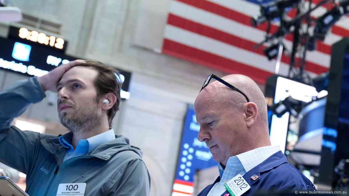 Wall Street falls as investors digest tech earnings