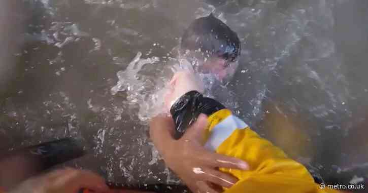 Dramatic bodycam shows rescue of two boys seconds from drowning