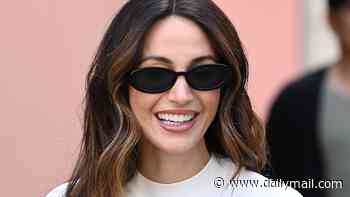 Michelle Keegan looks business chic in a two-tone top and tailored trousers as she leaves a photoshoot for her new Very range in Manchester
