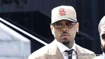 Singer Chris Brown arrives at court charged with attacking music producer with bottle in London club