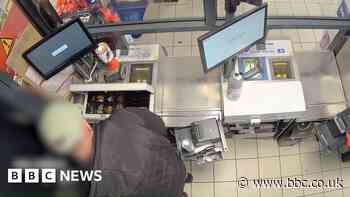 Watch: Cash till robber who threatened staff