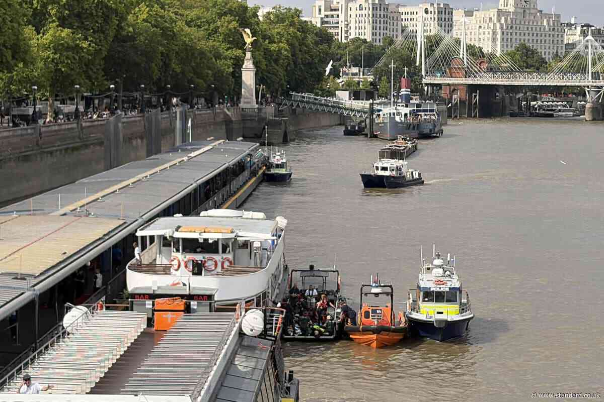 Five injured after boat carrying armed police crashes into Westminster Bridge