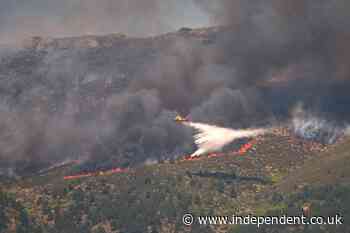 More than 130,000 evacuated in France and Spain as wildfires tear through southern Europe