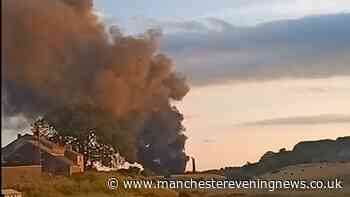 Fire crews tackling huge blaze as smoke sent billowing across Rochdale