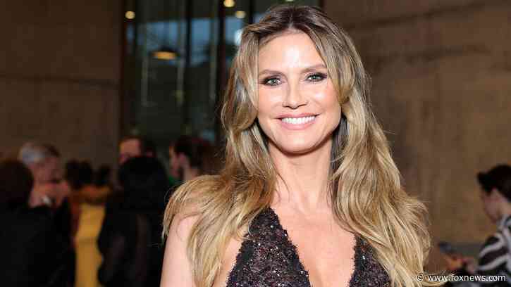 Heidi Klum ditches bikini top, covers up with potato chip bag on beach vacation