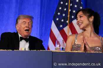 Trump smiles and shrugs after Epstein reporters he sued for $10B win awards for exposing birthday card