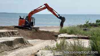 Heavy rain carves deep canyons into West Haven beach