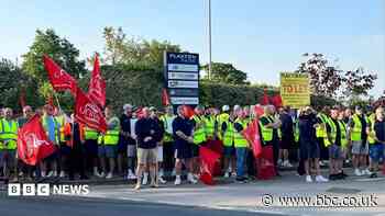 Bus firm 'committed' to resolving pay dispute