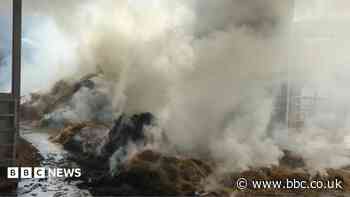 Crews tackle barn fire involving 100 tonnes of hay