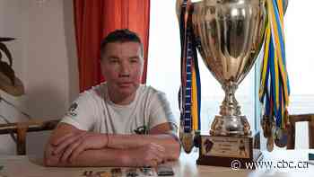 He spent years playing and coaching hockey alongside Russians. Then Putin invaded Ukraine