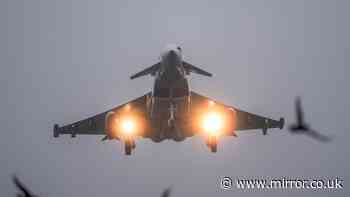 Police launch probe as RAF scrambles fighter jets for flight landing at Manchester