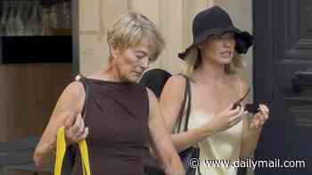 Margot Robbie looks chic in a yellow silk co-ord as she joins her mother Sarie Kessler on a girls' trip to Paris