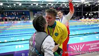 Sweet moment Sam Williamson celebrates Gold win with his partner after stunning 100m breaststroke final - as Aussie team cleans up at Commonwealth Games