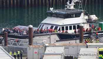 Teenager charged with piloting small boat to UK as over 640 migrants make trip in Burnham's first week as PM