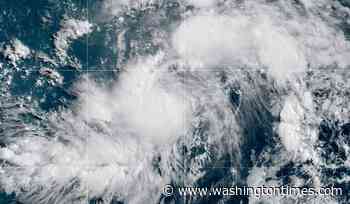 Hurricane Genevieve moves through the Pacific off Mexico, but no direct threat to land is forecast