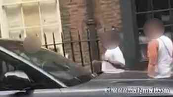 Horrific moment man in his 30s is stabbed in front of crowd during afternoon in busy Soho street