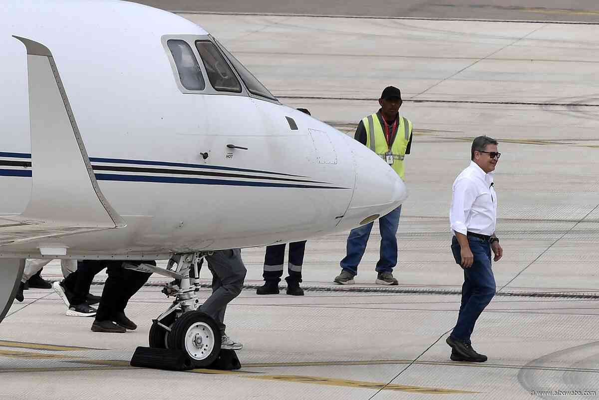 Former Honduran president Hernández returns home after Trump pardon