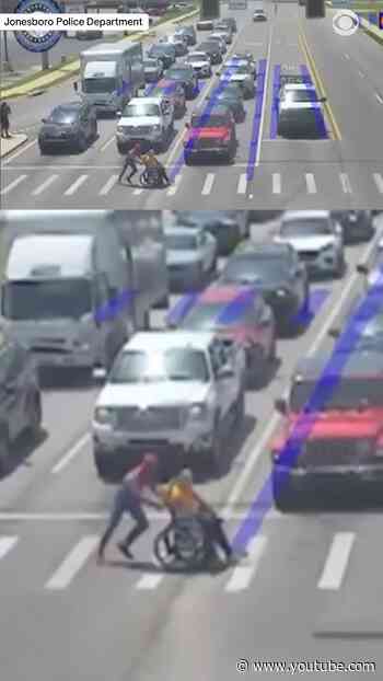 Person dressed as Spider-Man helps man in wheelchair cross busy intersection in Arkansas #shorts