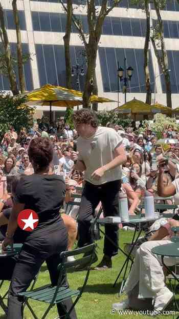LJ Benet jumps into the Broadway at Bryant Park crowd for THE LOST BOYS performance