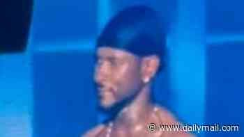 Usher kicks fan OFF STAGE after her awkward response to his seductive dance moves at Nashville concert