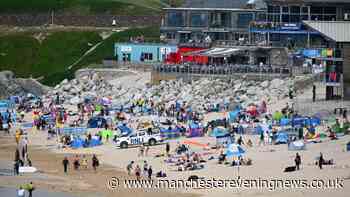 Two dead after being pulled from the water at UK holiday hotspot