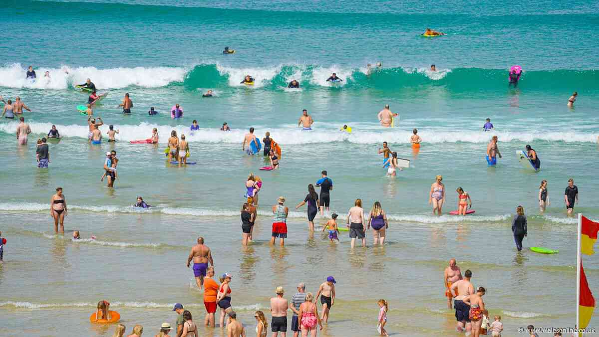 Two people die after being pulled from sea at famous beach