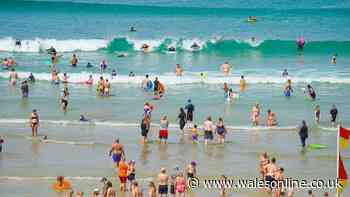 Two people die after being pulled from sea at famous beach