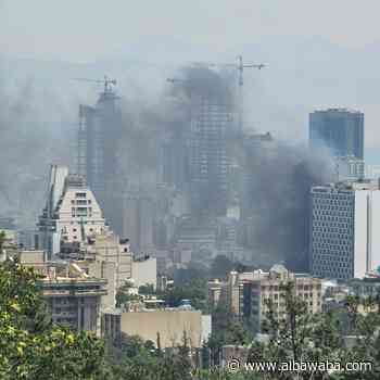 Fire erupts near Hotel Esteghlal in Iran