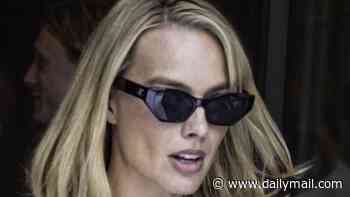 Margot Robbie reveals nasty leg bruise as she steps out in Paris
