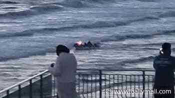 Man and woman who died at Fistral beach in Cornwall 'fell from rocks' as bystanders desperately tried to save them