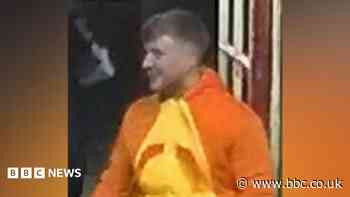 Police hunt darts match attacker in lobster suit