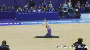 Hilarious moment cleaner steals the show at the Commonwealth Games as he dances to Queen while mopping the floor